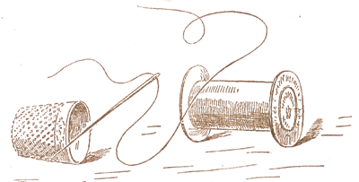 Fingerhut und Garnrolle